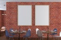 Cafe or restaurant intrerior with blank vertical poster on the red brick wall. Royalty Free Stock Photo