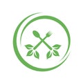 Cafe or restaurant serving Organic food logo- leaves from spoon and fork symbolizing Vegan friendly diet by European Vegetarian