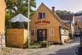 Cafe Rosa located in traditional half-timbered yellow house Royalty Free Stock Photo