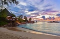 Cafe on Seychelles tropical beach at sunset Royalty Free Stock Photo