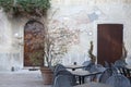 Cafe Table and Chair in Square on Street in Tuscany