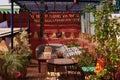 Cafe table and chairs with decorations and green plants