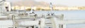 Cafe tables on the sea mediterranean embankment. selective focus. banner. Royalty Free Stock Photo