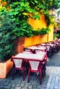 Cafe terrace in small European city Royalty Free Stock Photo