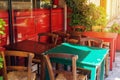Cafe terrace in small European city on sunny summer day Royalty Free Stock Photo