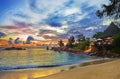 Cafe on tropical beach at sunset Royalty Free Stock Photo