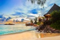 Cafe on tropical beach at sunset Royalty Free Stock Photo