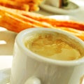 Cafe y porras, coffee and thick churros, the typical breakfast i