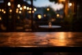 Cafes inviting glow surrounds a wooden table in the foreground