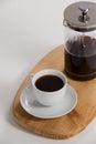 Cafetiere and a cup of black coffee Royalty Free Stock Photo