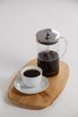 Cafetiere and a cup of black coffee Royalty Free Stock Photo