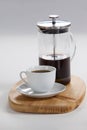 Cafetiere and a cup of black coffee Royalty Free Stock Photo