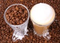 Caffe latte and coffee beans Royalty Free Stock Photo