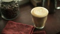 A Caffe Latte served on a coffee bar Royalty Free Stock Photo