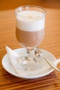 Caffe latte served in a glass Royalty Free Stock Photo