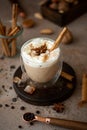 caffe latte with whipped cream, cinnamon and anise Royalty Free Stock Photo
