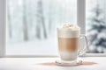 coffee latte layered with whipped cream on white table Royalty Free Stock Photo