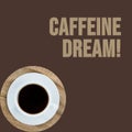 Caffeine dream text on brown with overhead of cup of black coffee