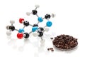 Caffeine molecule with coffee beans