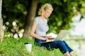 Caffeine power of nature. Energy charge and refreshment. Coffee cup take away close up shot. Coffee cup on green grass