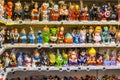 Caganers, sale in a Christmas market in Barcelona figurine in the nativity scenes, as a tradition in Catalonia, usually hidden in