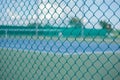 Cage of blurred tennis court Royalty Free Stock Photo