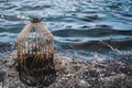 caged pond overflow spillway cover with buildup Royalty Free Stock Photo