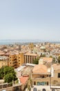 Photograph taken in the city of Cagliari, Italy, capturing an aerial view of the entire cityscape and its buildings