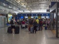 Cagliari, Sardinia, Italy, September 20, 2020: People waiting in qeue at check-in counter at Cagliari Elmas airport Royalty Free Stock Photo