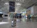 Cagliari, Sardinia, Italy, September 20, 2020: View of interior of Cagliari Elmas airport hall with shops and people Royalty Free Stock Photo