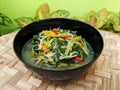 Cah kangkung or tumis kangkung, stir fried water spinach, common asian vegetable dish Royalty Free Stock Photo