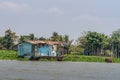 Crumbling house along Mekong River, Cai Be, Vietnam