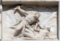 Cain killing Abel, marble relief on the facade of the Milan Cathedral Royalty Free Stock Photo