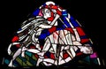 Cain killing Abel in stained glass