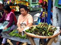 A vendor sells Tupig, a local delicacy made from glutenous rice Royalty Free Stock Photo