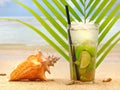 Caipirinha Cocktail with Leaf at the Beach Royalty Free Stock Photo