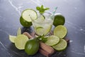 Caipirinha cocktail in glass on marble table, lemon slices and mint Royalty Free Stock Photo