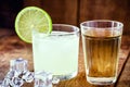 Caipirinha cocktail in glass on wooden table background. Copyspace, bar menu image, international caipirinha day, 13th September Royalty Free Stock Photo