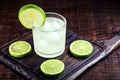 Caipirinha cocktail in glass on wooden table background. Copyspace, bar menu image, international caipirinha day, 13th September Royalty Free Stock Photo