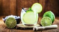 Caipirinha cocktail in glass on wooden table background. Copyspace, bar menu image, international caipirinha day, 13th September