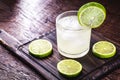 Caipirinha cocktail in glass on wooden table background. Copyspace, international caipirinha day, 13th September Royalty Free Stock Photo