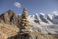 Cairn in the alps with glacier in the background, Switzerland