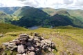 Cairn in the Foreground, Helvellyn behind Royalty Free Stock Photo