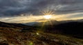 Cairn outdoors in nature during golden hour and sunset. Panoramic view Royalty Free Stock Photo