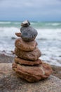 Cairn on a rock at the beach