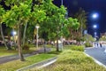 Cairns, Australia - August 22, 2009: Tourists and locals at night along the city streets