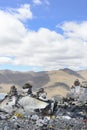 Cairns mark a mountaintop of the Tibetan Plateau in Brahmaputra Valley of the Tibet Autonomous Region of China. Royalty Free Stock Photo