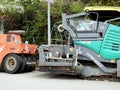 Cairo, Egypt, April 8 2023: Asphalt paver trucks and compactors, A paver (road paver finisher, asphalt finisher, road paving Royalty Free Stock Photo