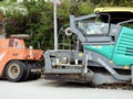 Cairo, Egypt, April 8 2023: Asphalt paver trucks and compactors, A paver (road paver finisher, asphalt finisher, road paving Royalty Free Stock Photo