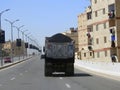 Cairo, Egypt, April 16 2023: A Lorry with bitumen Asphalt, a sticky, black, highly viscous liquid or semi-solid form of petroleum Royalty Free Stock Photo